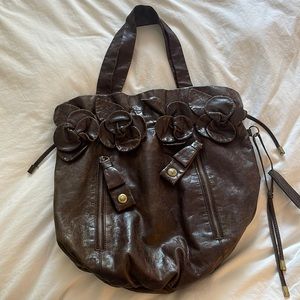 Cynthia Rowley dark brown leather purse. Good condition.